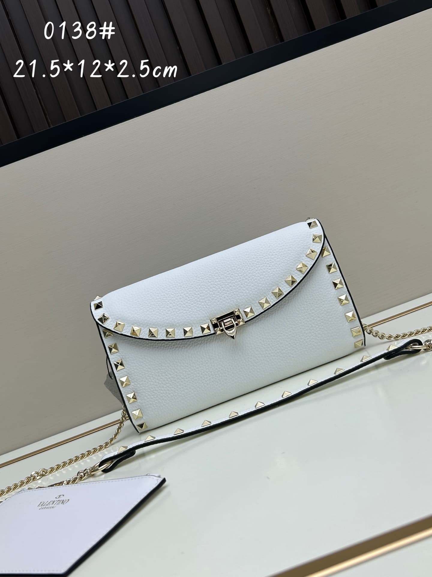 C8296 Garavani Rockstud Mini leather crossbody bag, featuring the iconic hook closure design — image 1