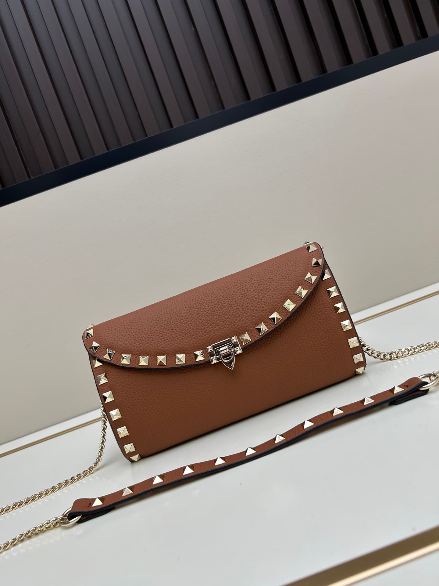 C8292 Garavani Rockstud Mini leather crossbody bag, featuring the iconic hook closure design — image 1