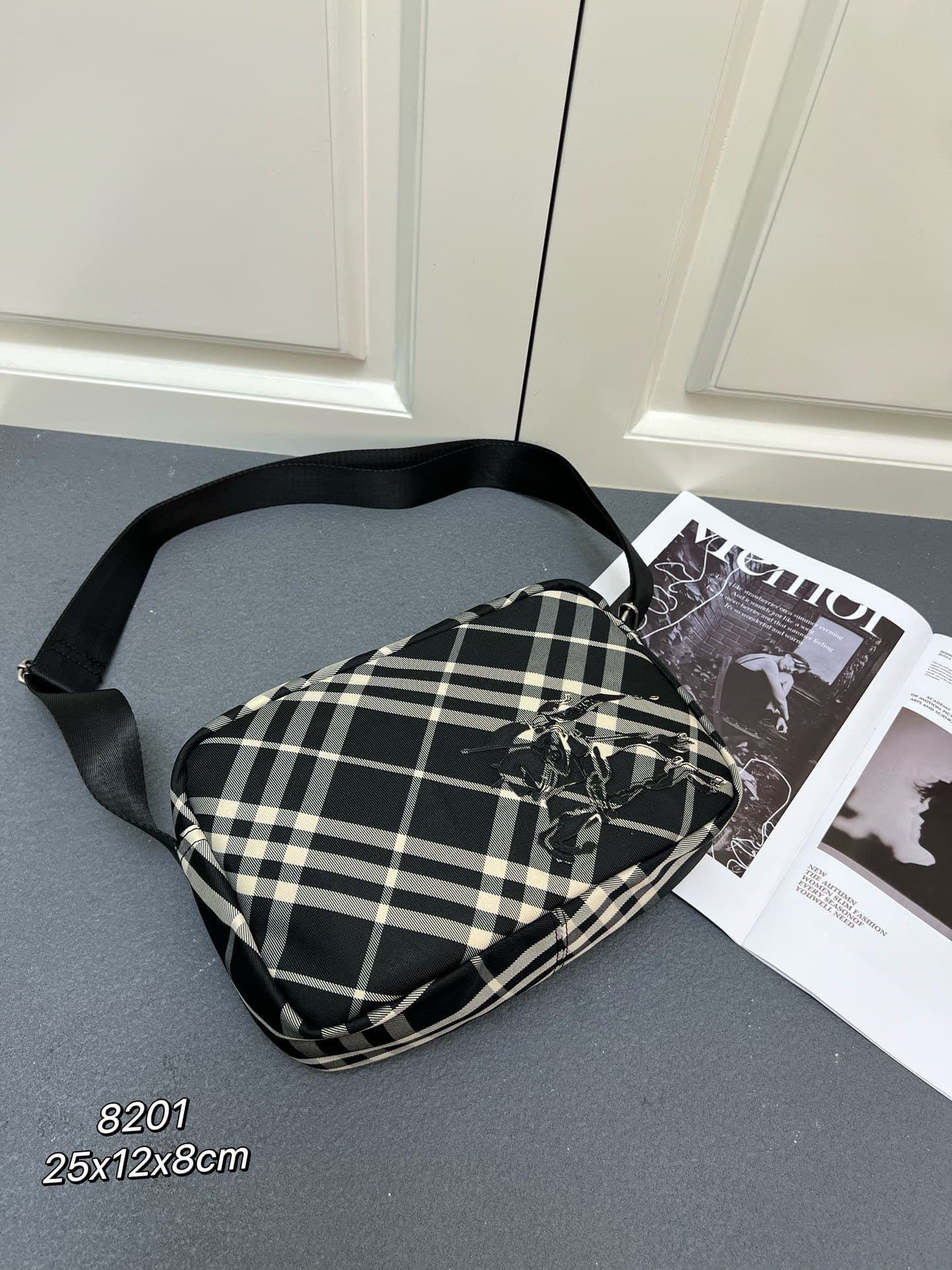 C33 ¥ (B brand) crossbody backpack, adorned with fine-woven Burberry plaid pattern. Features a equestrian emblem (EKD) patch, with a solid-colored lining. Equipped with a B-shaped zipper pull, and has 4 outer pockets for storing various small items. A cla — image 1
