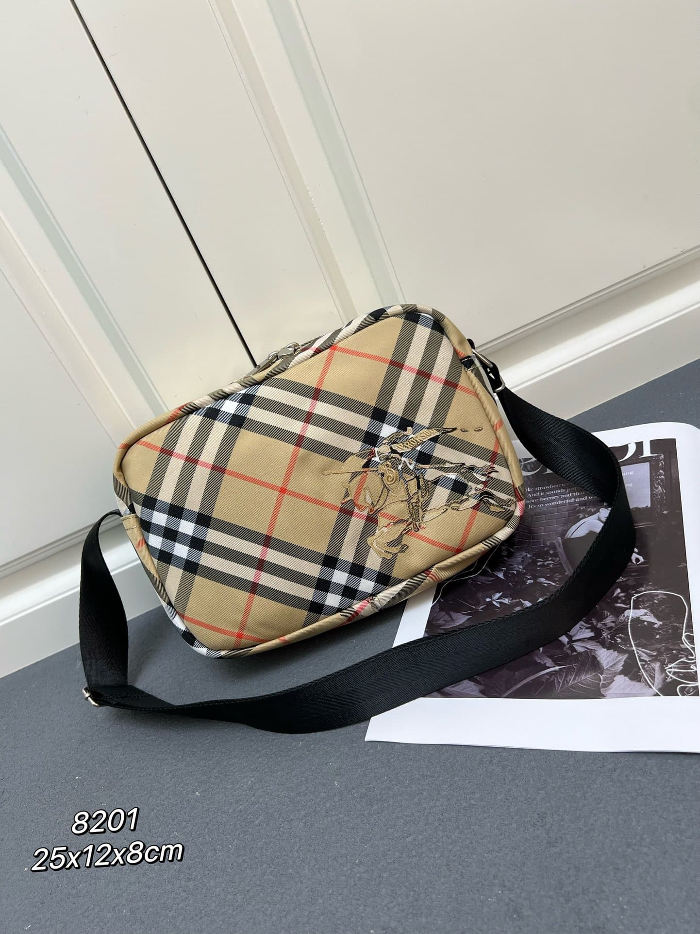 C31 ¥ (B brand) crossbody backpack, adorned with fine-denim Burberry check pattern. Features embroidered EKD crest patches, with a solid-colored lining. Equipped with a B-shaped zipper pull and 1 external pockets for storing various small items. A classic — image 1