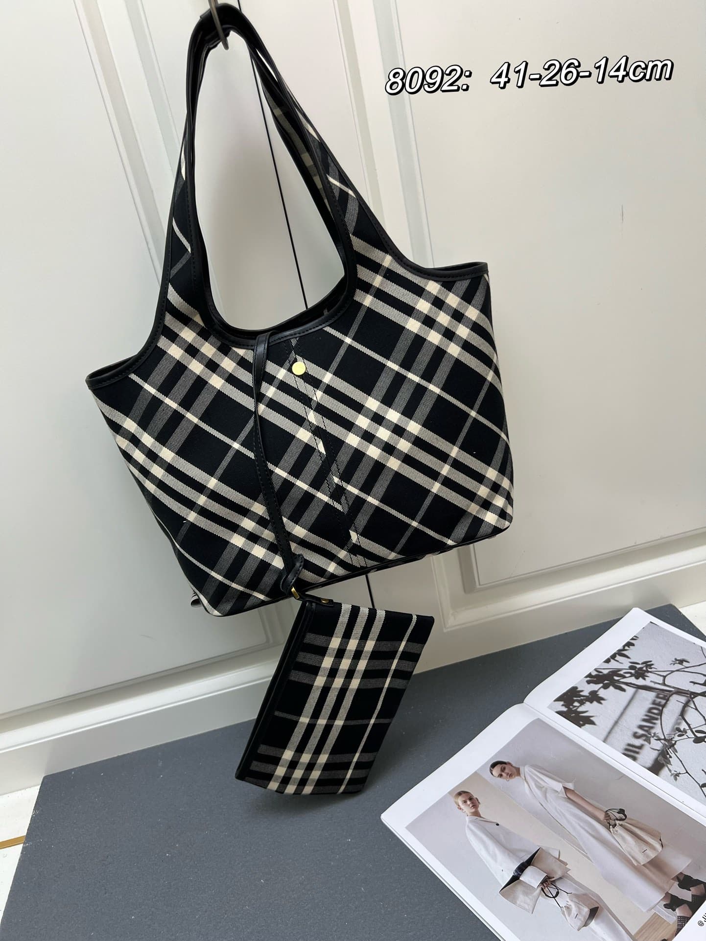 C23 ¥: B brand's latest soft and stretchable tote bag, made from cotton twill fabric and crafted in an Italian atelier. Decorated with new collection B brand pattern. Lightweight without lining, featuring a smooth calfskin trim and a detachable zipper poc — image 1