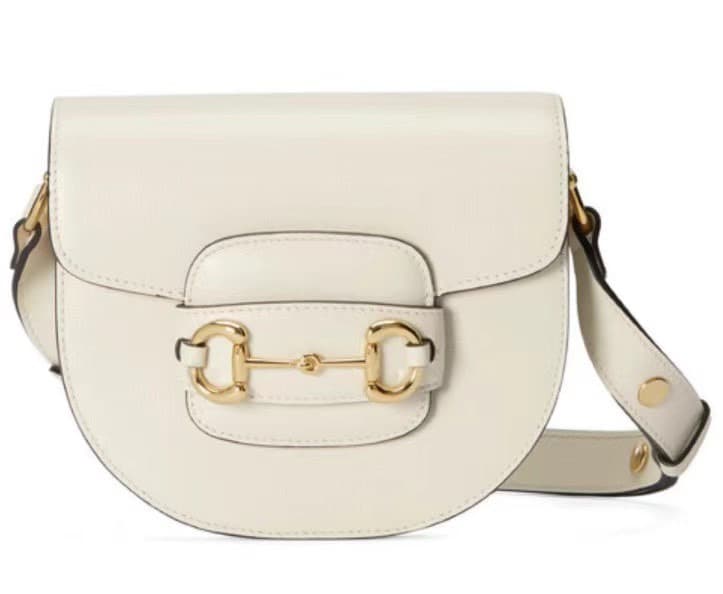 C4068 The original leather mini crossbody bag from the “Aria – Melody of Fashion” collection reinterprets classic elements using modern techniques. The bamboo motif is one of Gucci’s iconic elements; it has appeared in various collections since the 1990s. — image 1