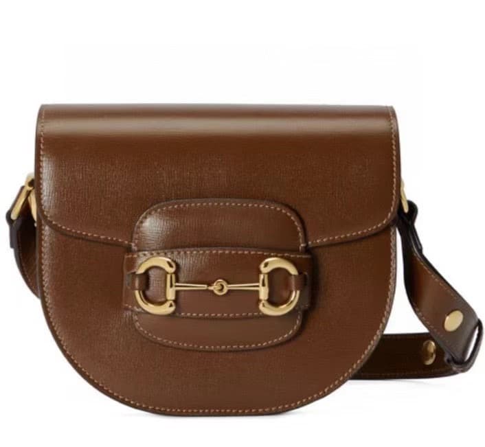 C4069 The original leather mini crossbody bag in the “Aria – Melody of Fashion” collection reinterprets classic elements using modern techniques. The bamboo pattern is one of Gucci’s iconic elements; it has appeared in various collections of the brand sin — image 1