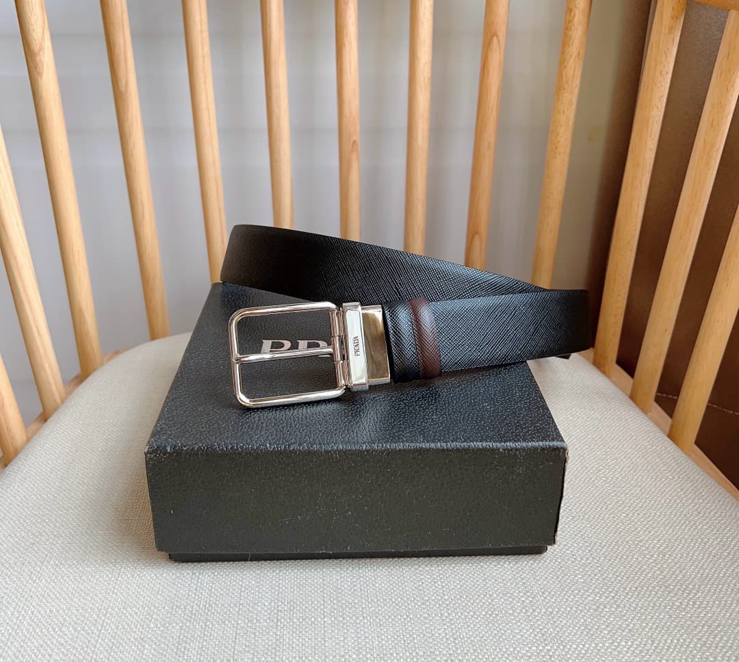 C32931 Prada – This double-sided belt features the iconic Saffiano leather material, along with metal buckles in a distinctive design. It exudes elegance and a modern style. Width: 3.5cm — image 1