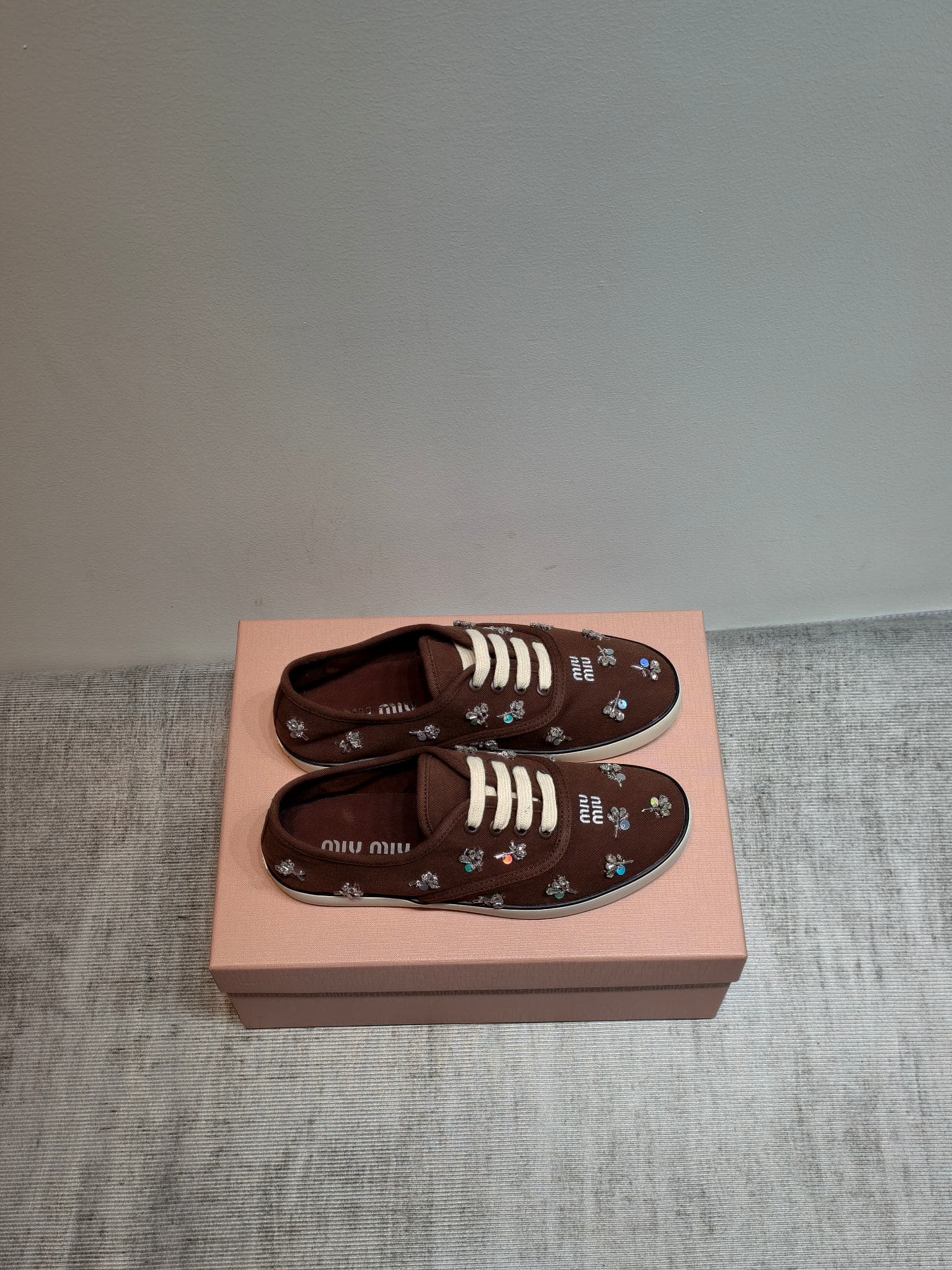 D10642 MIUMIU 2026 new model. The upper is made of twill canvas (textile material) with a textile lining. The sole is made of rubber with the brand logo. The insole is a detachable fabric insole, offering both comfort and a distinct brand feel. Iconic “pe — image 1