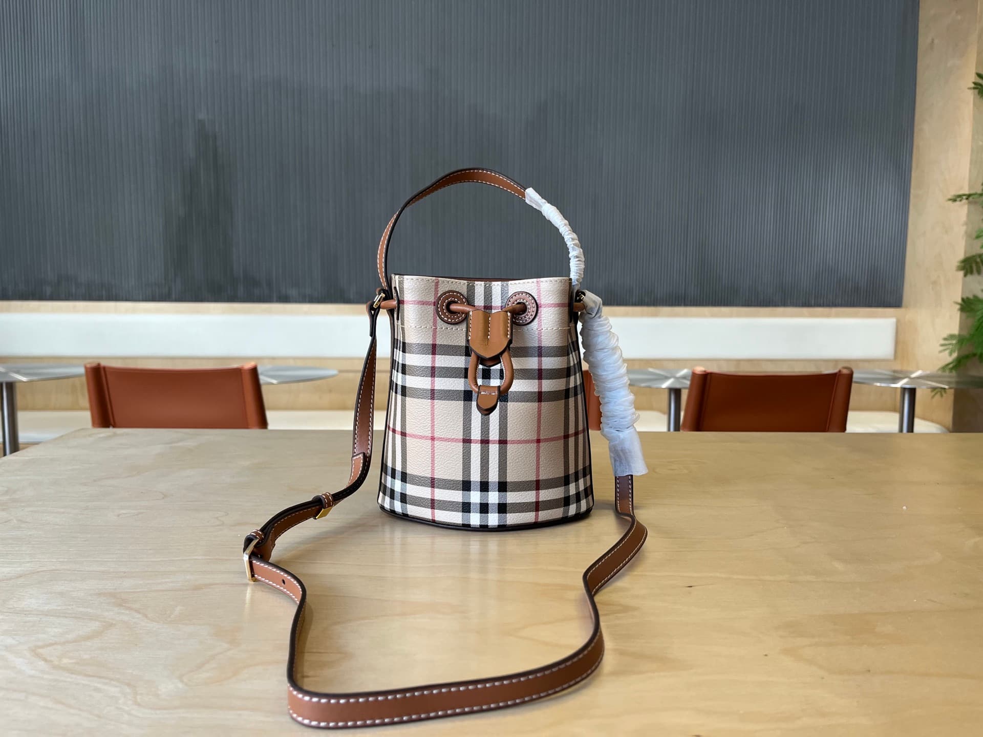 C15 B Brand Mini Bucket Bag with Pins, Vintage/retro Burberry pattern, Italian tanned leather trim and TB exclusive logo. 11, 16.5, 18.5cm detachable adjustable diagonal straps. Adjustable pin closure. Hand-painted lacquered edges. Glossy metal accessorie — image 1