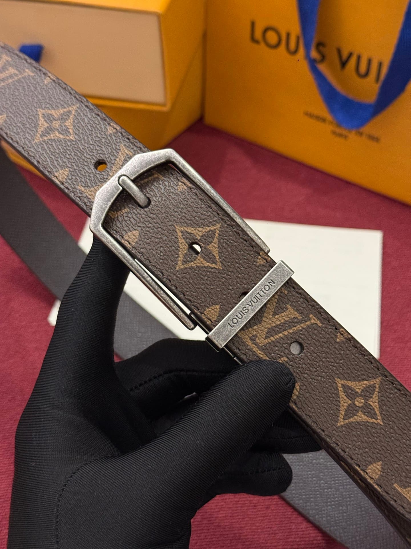 C32957 This Slender double-sided belt features Monogram-coated canvas and leather, along with intricate buckles and metal bands bearing the Louis Vuitton logo. — image 1