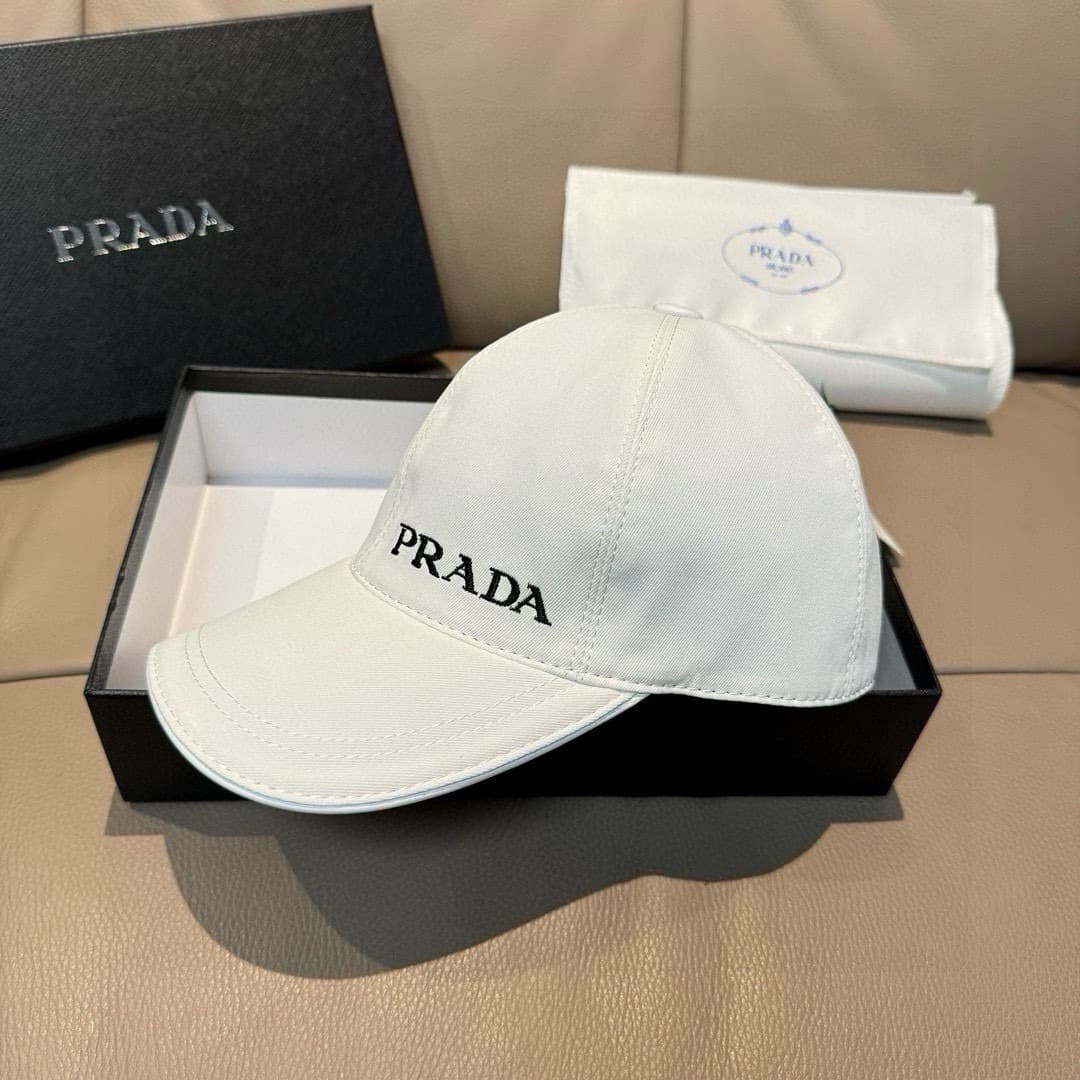 C29852 Bag-shaped hat, Prada new model baseball cap. Embroidered logo. Customized by 1:1. Original pure cotton fabric + first-grade cowhide material – lightweight and breathable! Excellent quality. Basic head circumference: 56; adjustable clip. — image 1