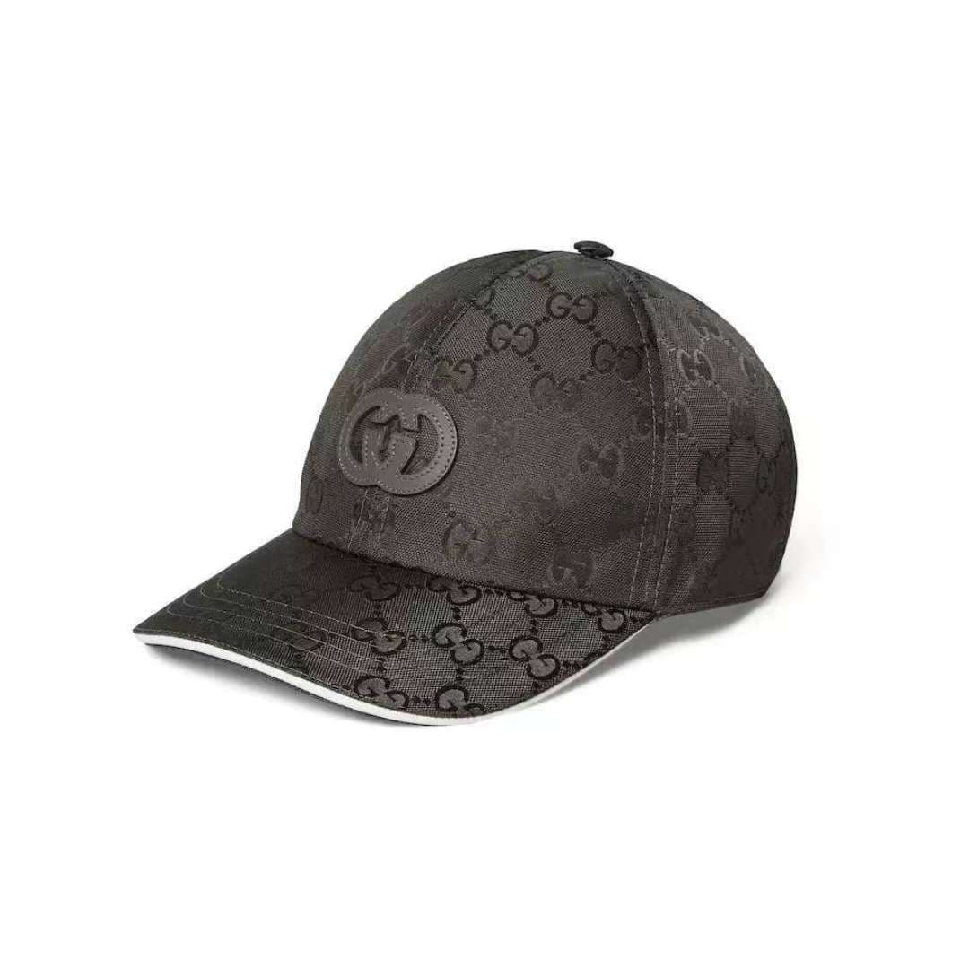 C29822 Gucci 2025 Early Autumn Collection presents a variety of energetic soft accessories. This baseball cap is crafted with precision using GG nylon, adorned with interlocking G embroidery patches, bringing a unique and distinctive touch. — image 1