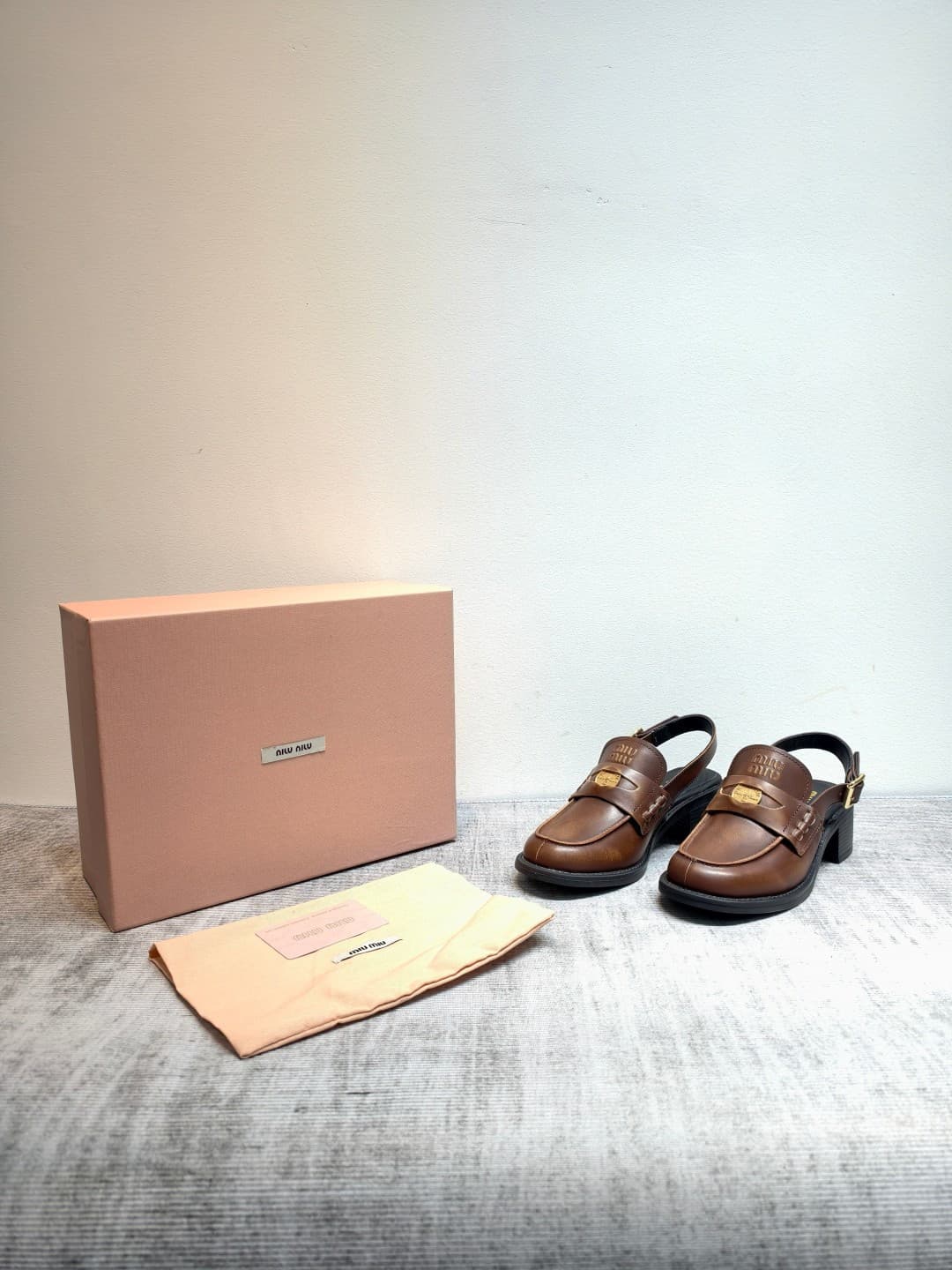 D10646 MIUMIU 2026 New Vintage/Retro Loafers – Upper: Main material is high-quality calfskin/leather; some models feature aged waxed leather for a vintage look. There are also different versions including glossy polished leather, wine-red colored leather, — image 1